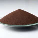 LANXESS Iron Oxide Brown 4610 pigment in a glass dish.