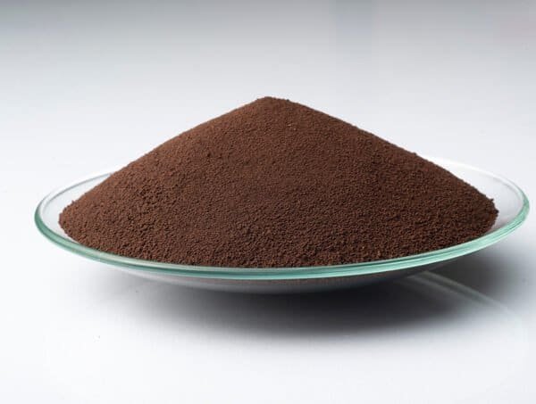 LANXESS Iron Oxide Brown 4610 pigment in a glass dish.